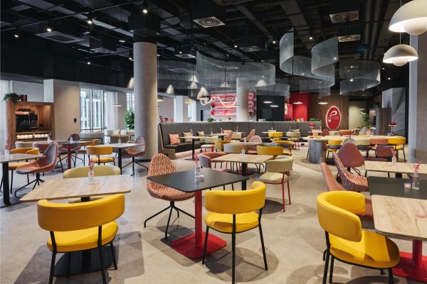 Prize by Radisson Wroclaw Sky Tower hotel in Poland featuring contemporary interiors and panoramic city views